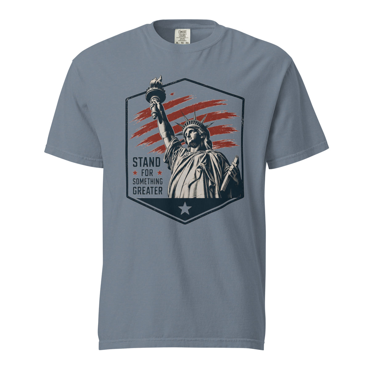 Blue men's t-shirt with statue of liberty and red stripes, that says "Stand for something greater" beside it