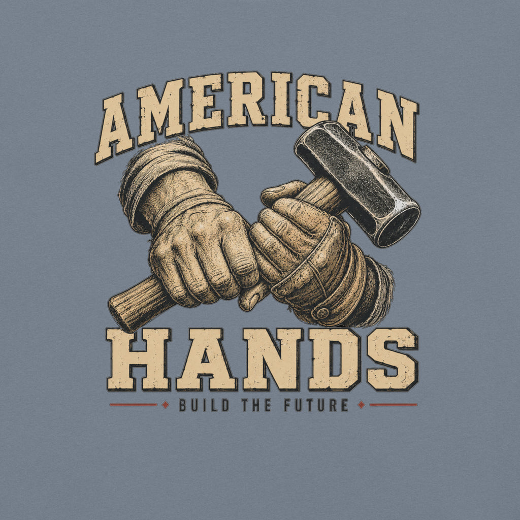 Blue men's t-shirt with American Hands written above and below rough hands holding a sledge hammer and build the future written beneath