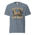 Blue men's t-shirt with American Hands written above and below rough hands holding a sledge hammer and build the future written beneath