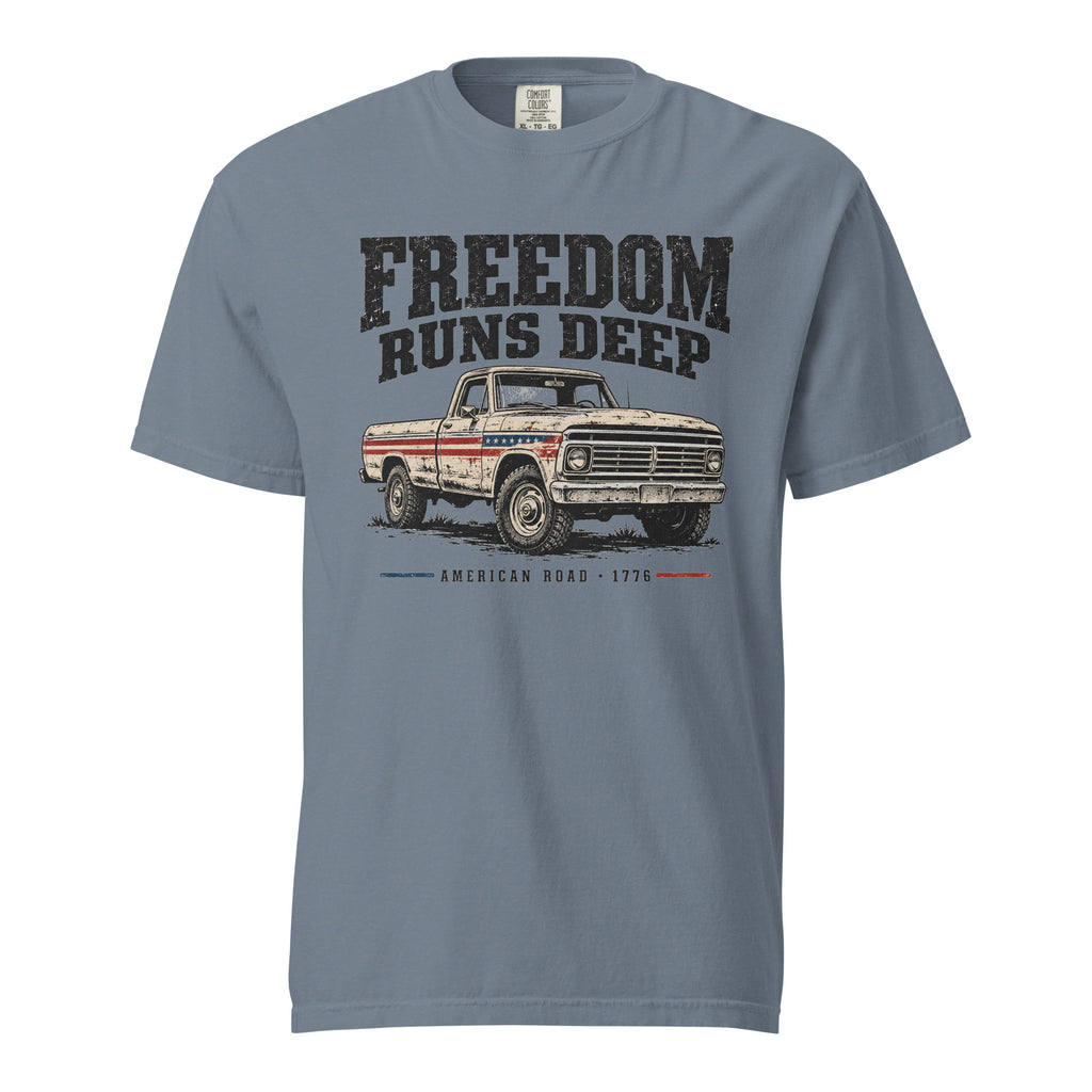 blue men's t-shirt with Freedom Runs Deep written across the top above a vintage American truck 