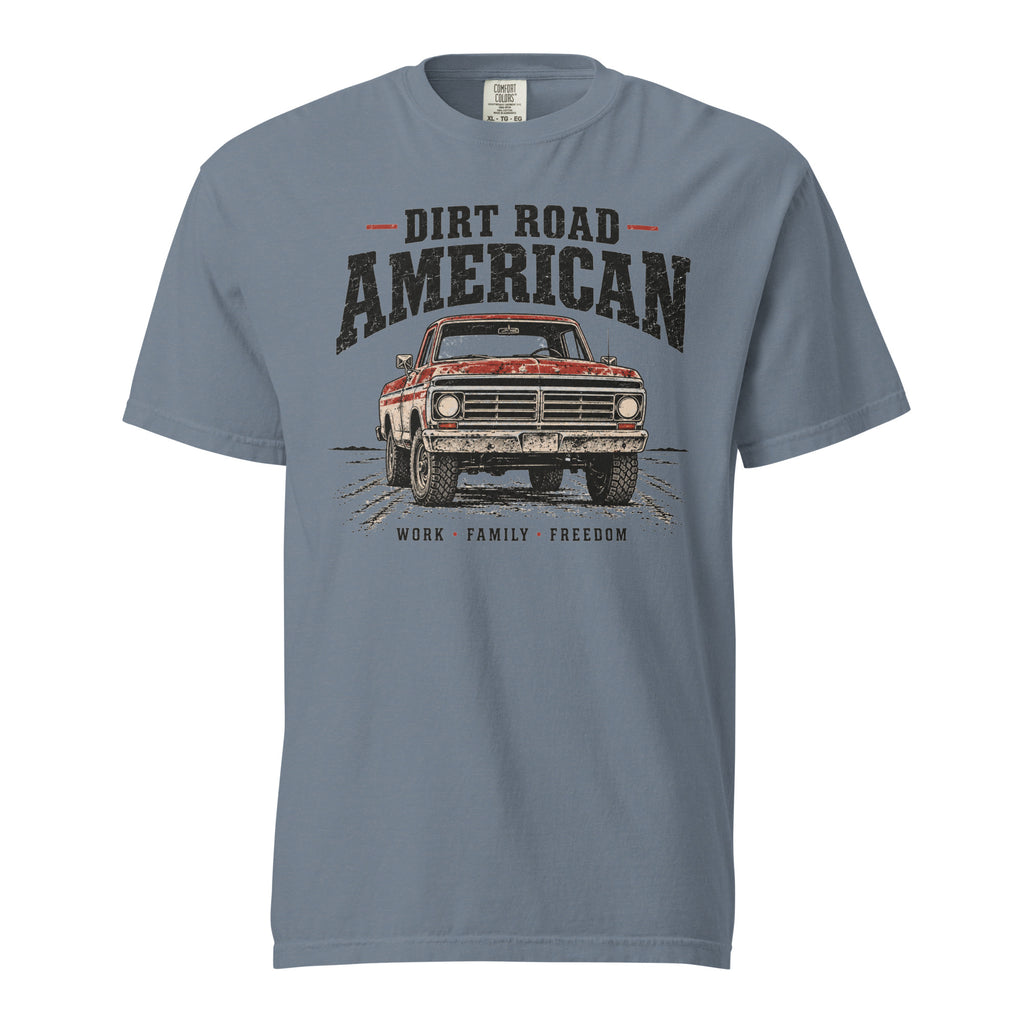 blue men's t-shirt that says Dir Road American above a vintage American truck colored dusty red on a dirt road silhouette