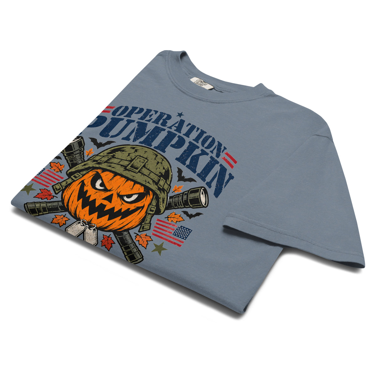 blue t-shirt with military pumpkin focal point, text saying "Operation pumpkin, Mission: Scare" along the top and bottom, with bats, leaves, and other fall accents