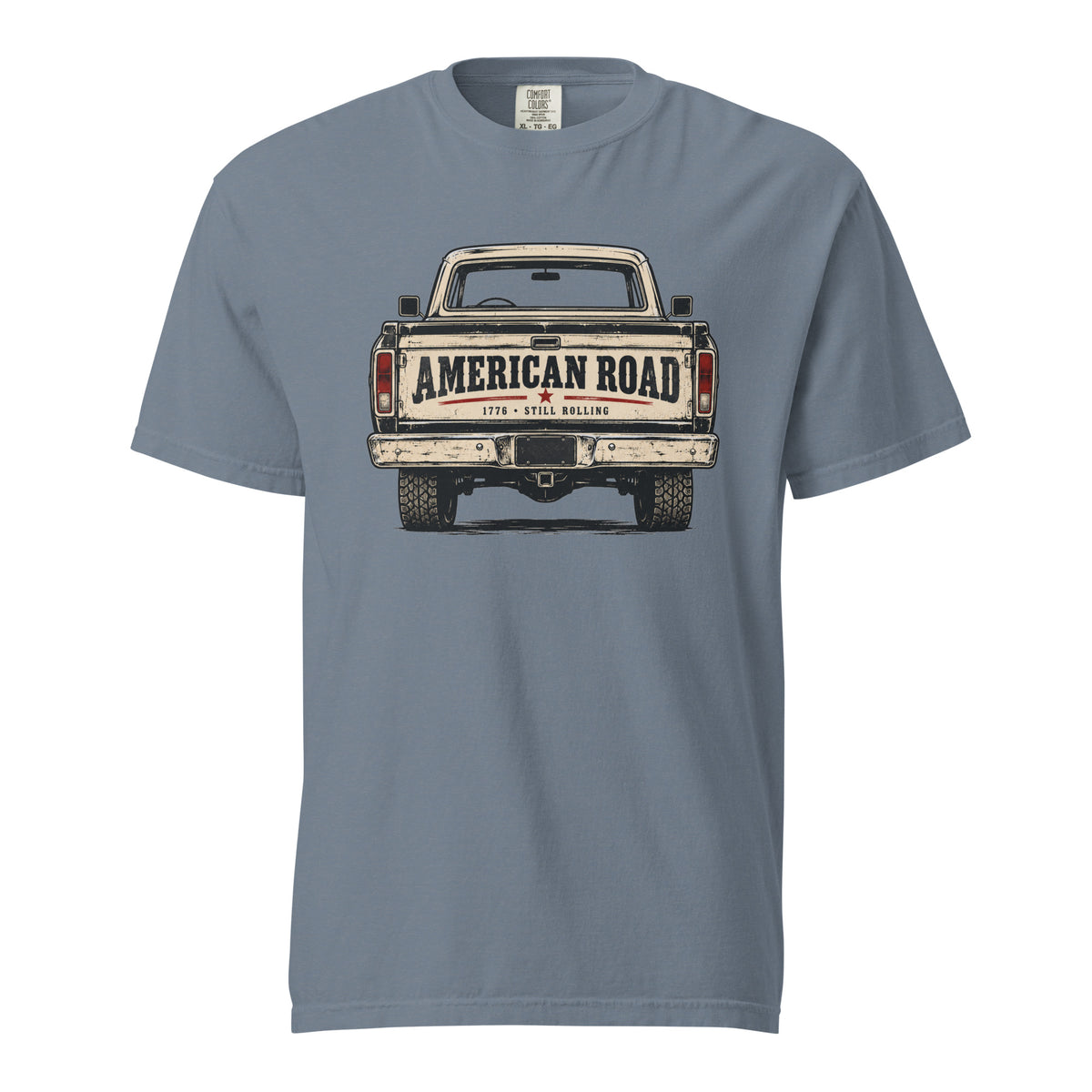 blue men's t-shirt with American Road written across the tailgate of a vintage American truck