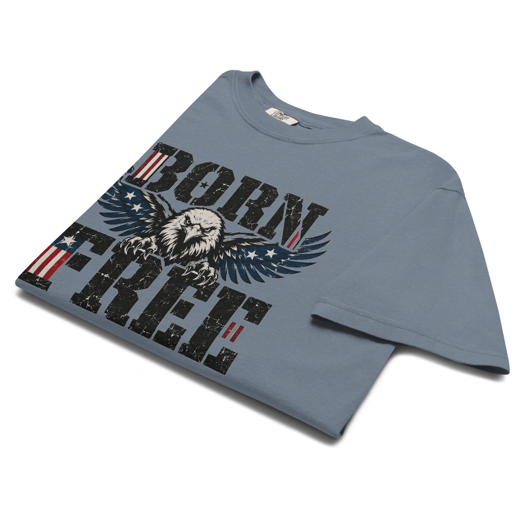 blue men's t-shirt with Born Free written in large letters and an eagle breaking through between them