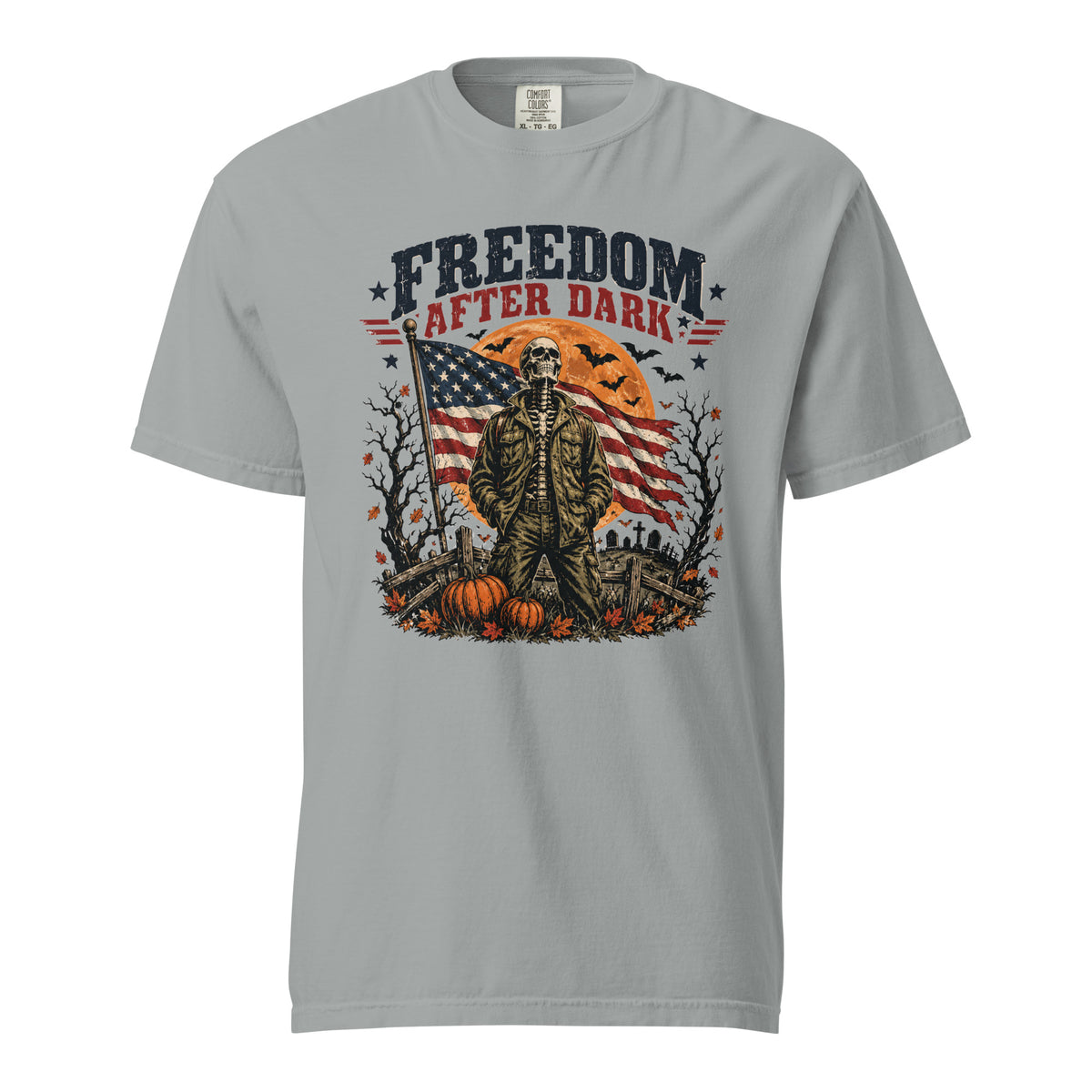grey t-shirt with skeleton in front of American flag and moon, with Freedom after dark text above, and Halloween icon detail accents