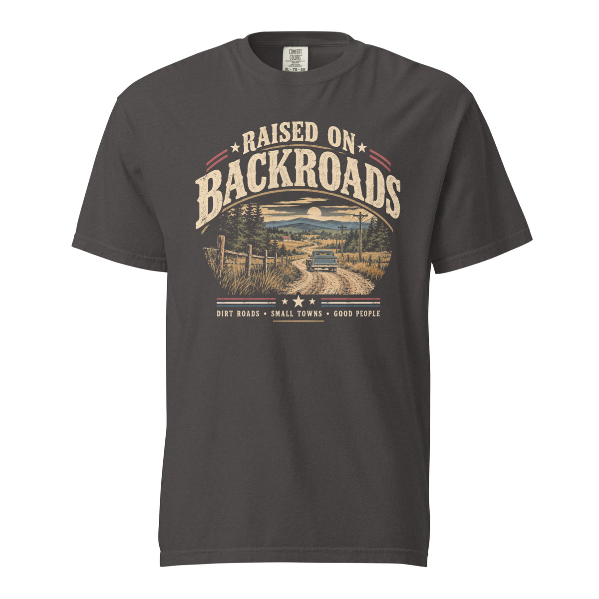gray men's t-shirt with text saying "Raised on backroads" above a dirt road with truck graphic, red, white and blue accents