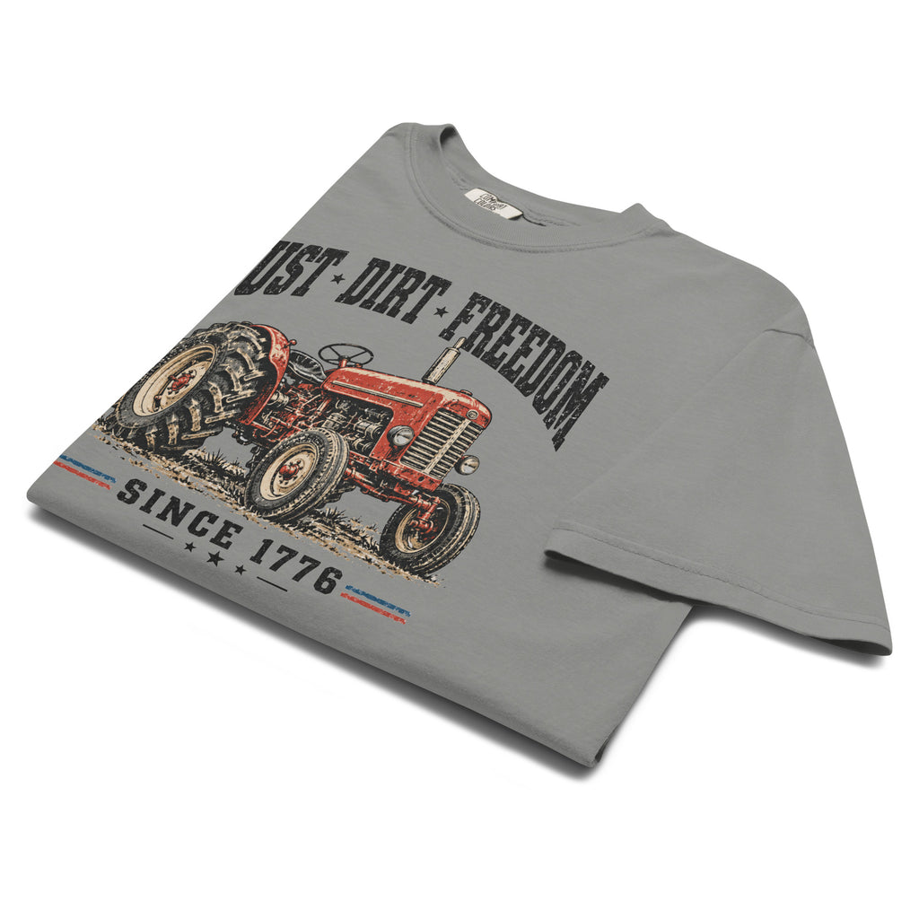 men's grey t-shirt with vintage red tractor graphic, and the words "Dust dirt freedom, since 1776" written above and below