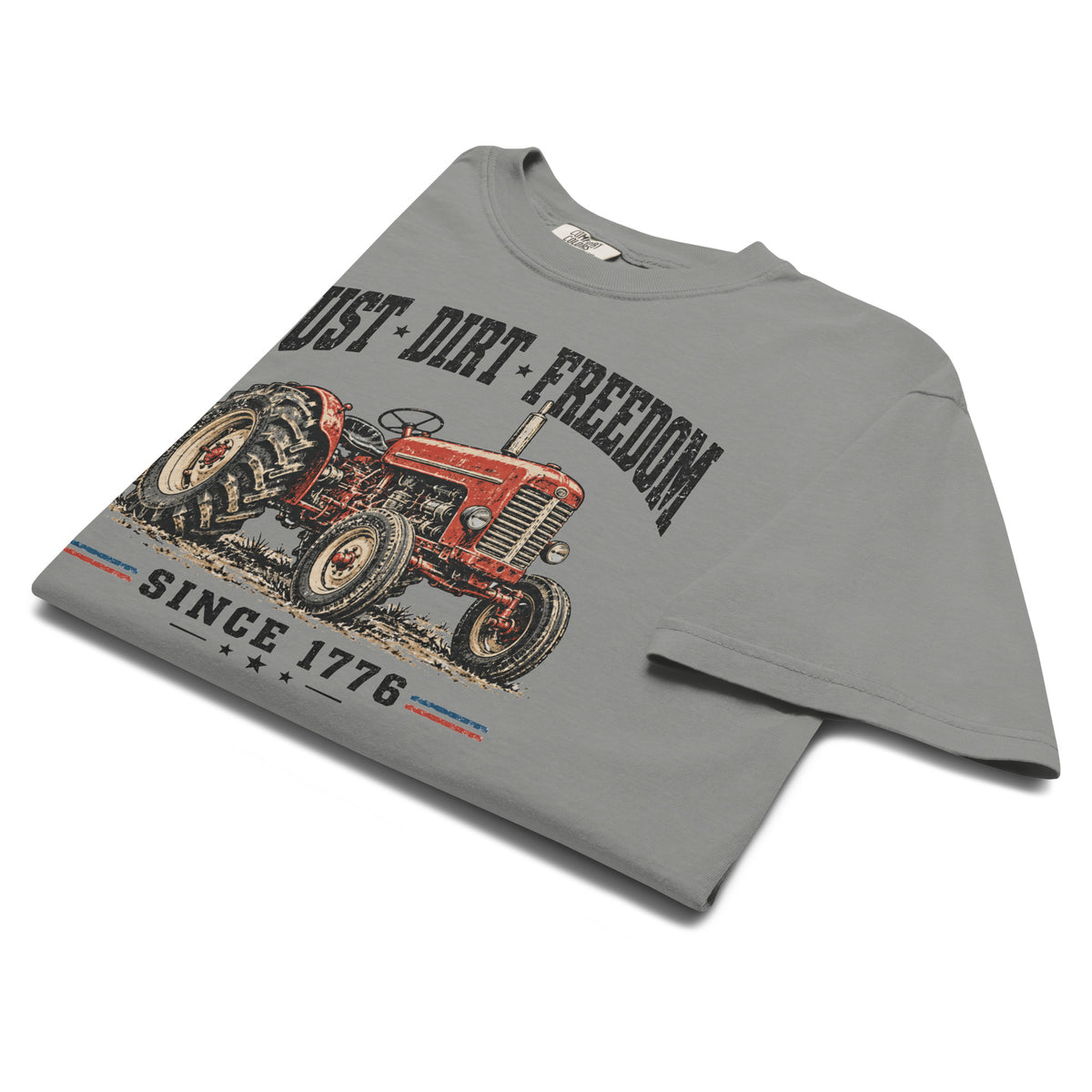 men's grey t-shirt with vintage red tractor graphic, and the words "Dust dirt freedom, since 1776" written above and below