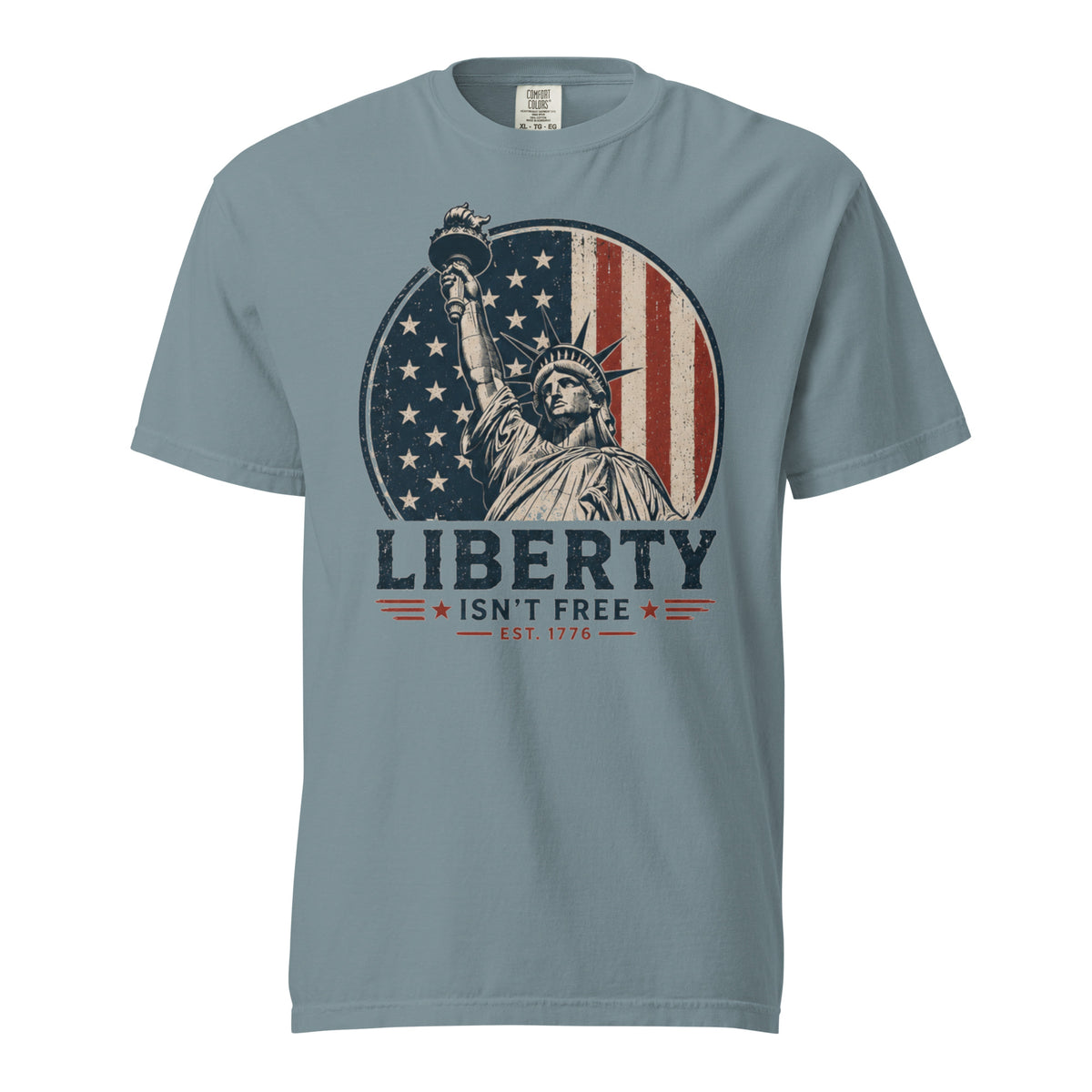 Blue men's t-shirt with American flag statue of liberty graphic, and text that says "Liberty isn't free" underneath