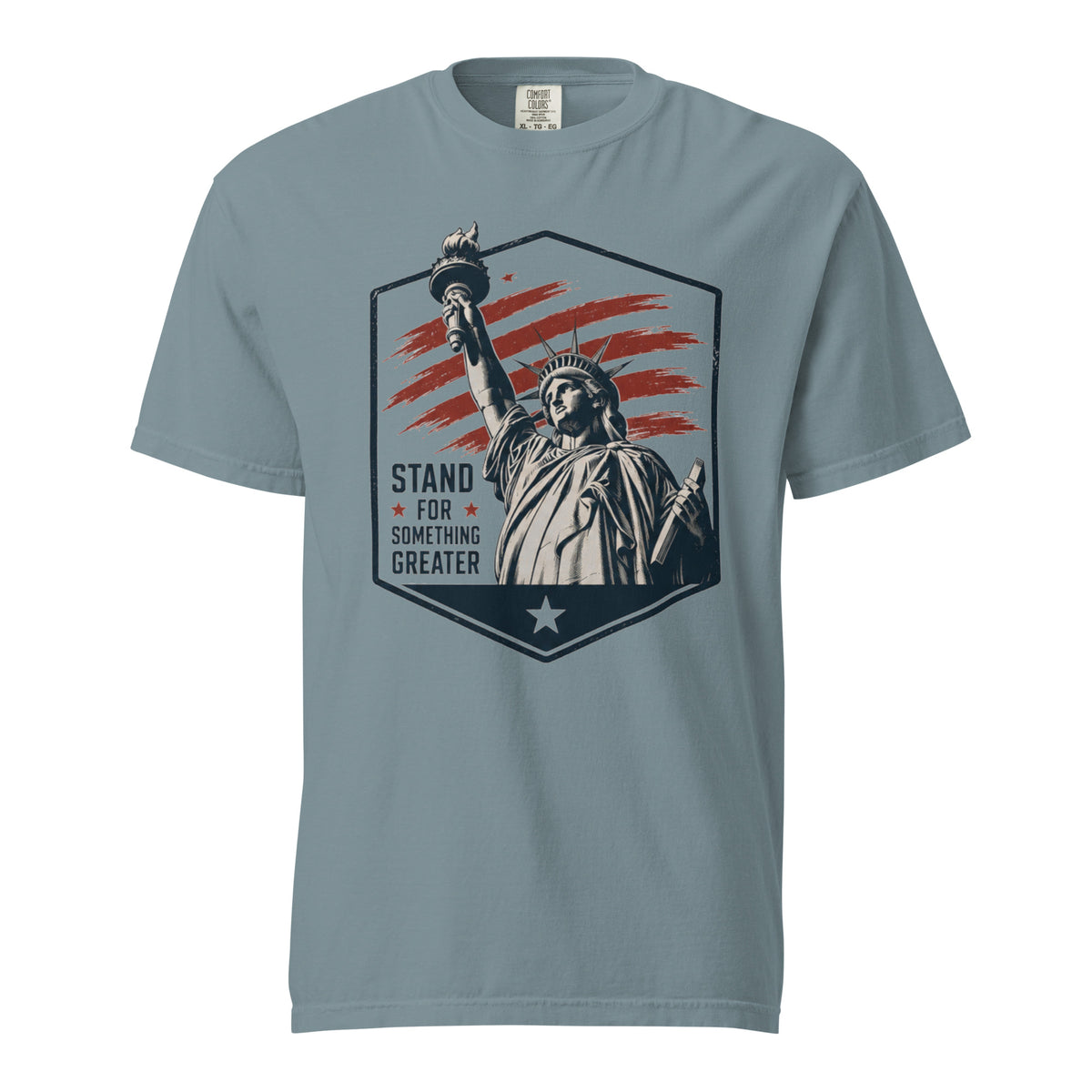 Blue men's t-shirt with statue of liberty and red stripes, that says "Stand for something greater" beside it