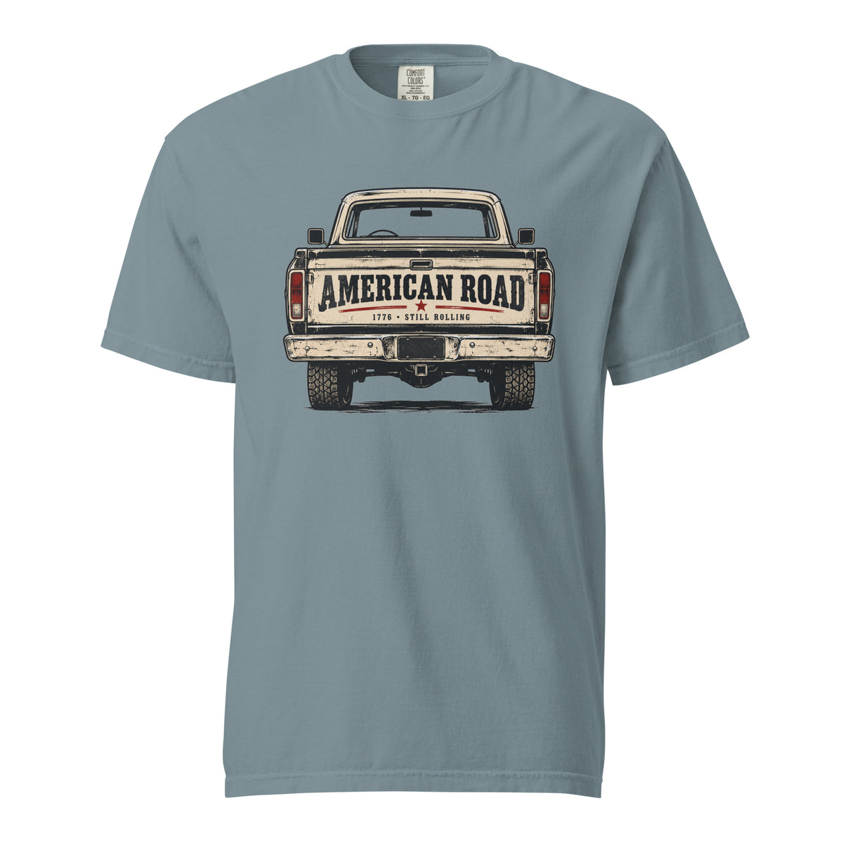 blue men's t-shirt with American Road written across the tailgate of a vintage American truck