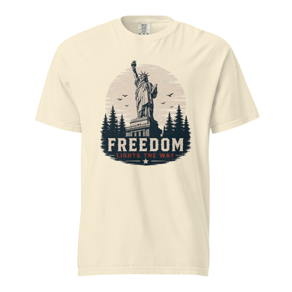 off-white men's t-shirt with statue of liberty and trees, that says "Freedom Lights the way" under it