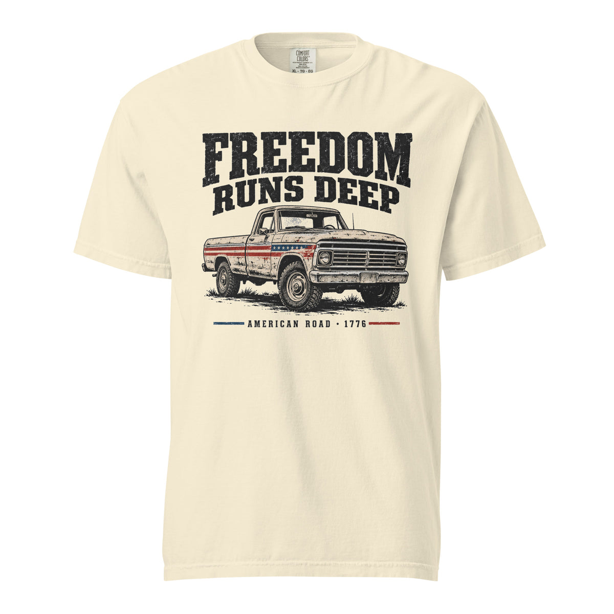 off-white men's t-shirt with Freedom Runs Deep written across the top above a vintage American truck 