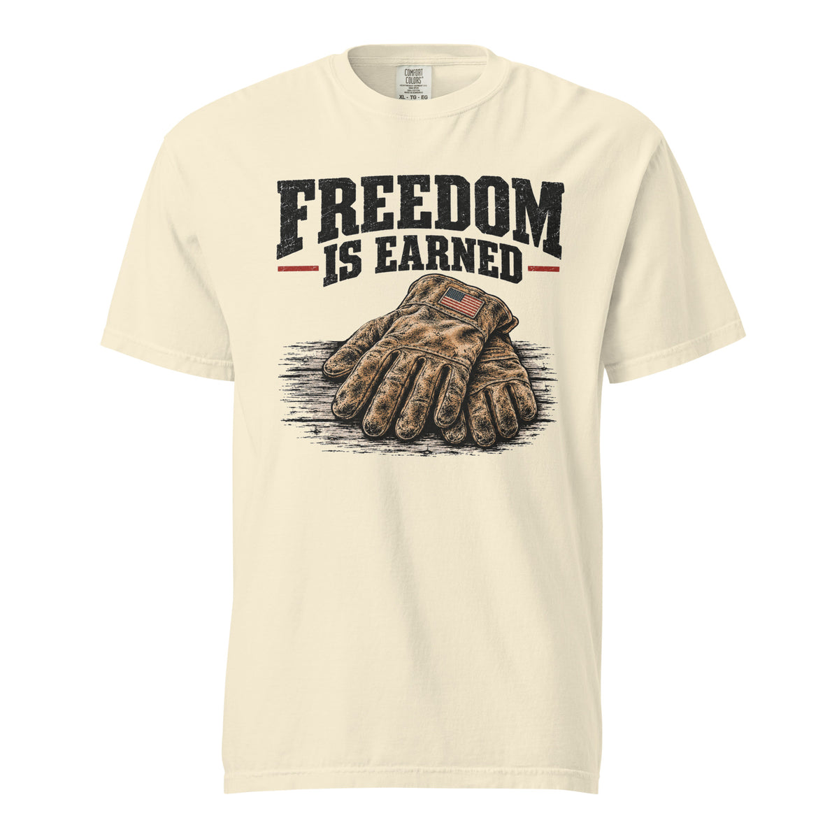 off-white men's t-shirt with work gloves on a wooden surface, and above it says "Freedom is earned"