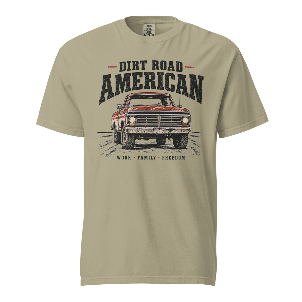 Tan men's t-shirt that says Dir Road American above a vintage American truck colored dusty red on a dirt road silhouette