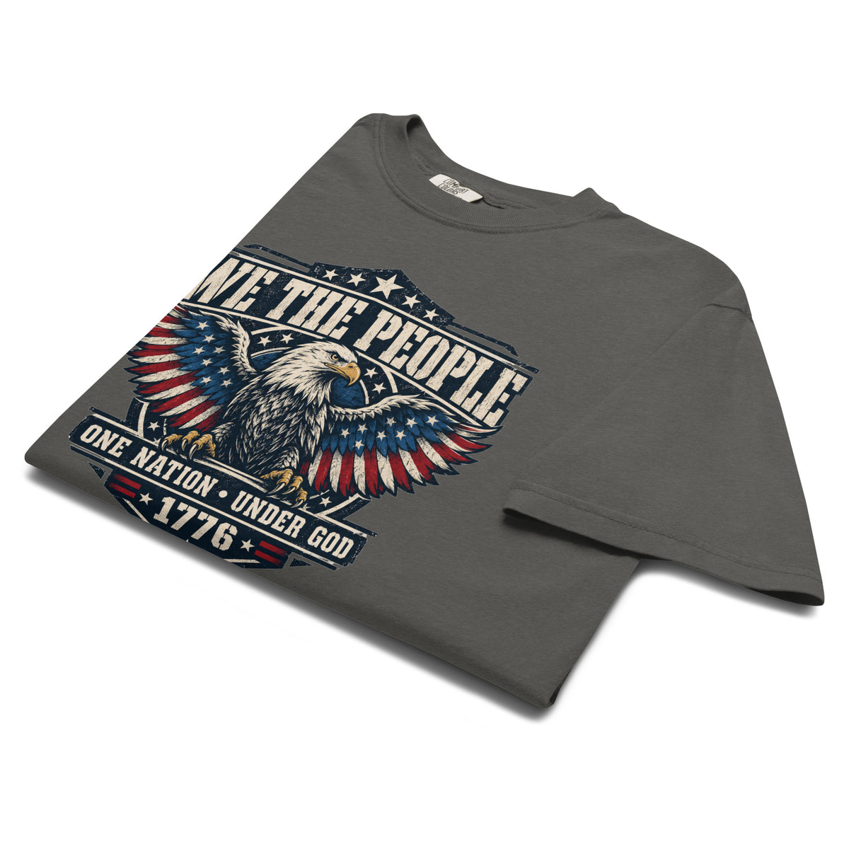gray men's t-shirt with "we the people" across the top and an eagle graphic below, with written "One nation under god" and "1776" at the bottom