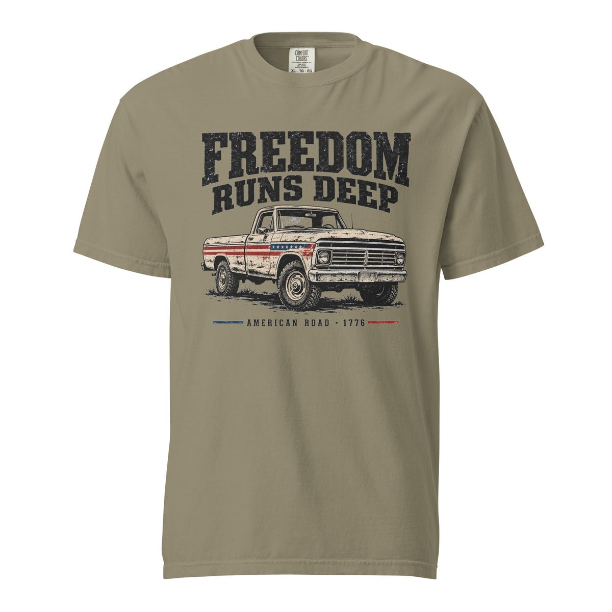 green men's t-shirt with Freedom Runs Deep written across the top above a vintage American truck 