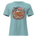 blue shirt with circular focal point that says "Stars, stripes & Spooky nights", with American flag, flowers, bats, and Halloween accents around
