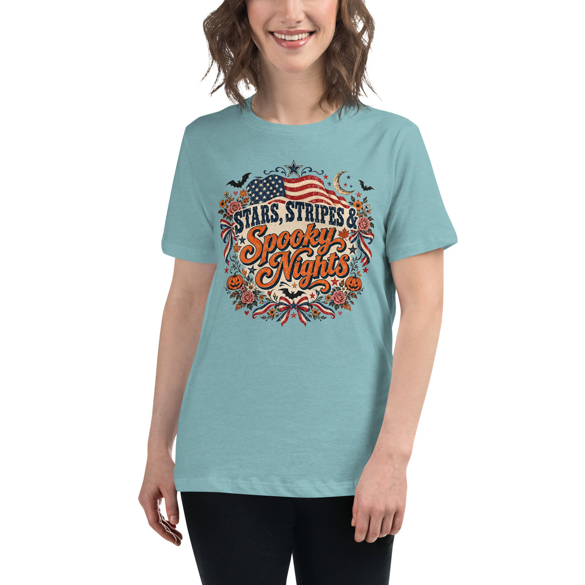 blue shirt with circular focal point that says "Stars, stripes & Spooky nights", with American flag, flowers, bats, and Halloween accents around