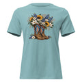 blue women's t-shirt with red, white, blue cowgirl boots graphic with wildflowers coming out of it