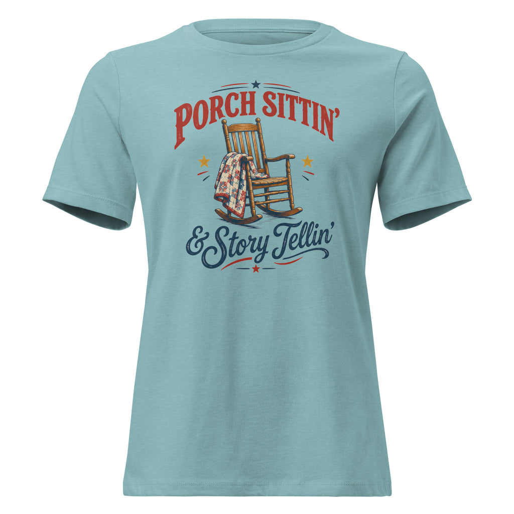 blue women's t-shirt with rocking chair graphic that says "Porch sittin & Story tellin" in southern country vibe
