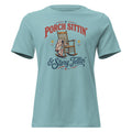 blue women's t-shirt with rocking chair graphic that says "Porch sittin & Story tellin" in southern country vibe