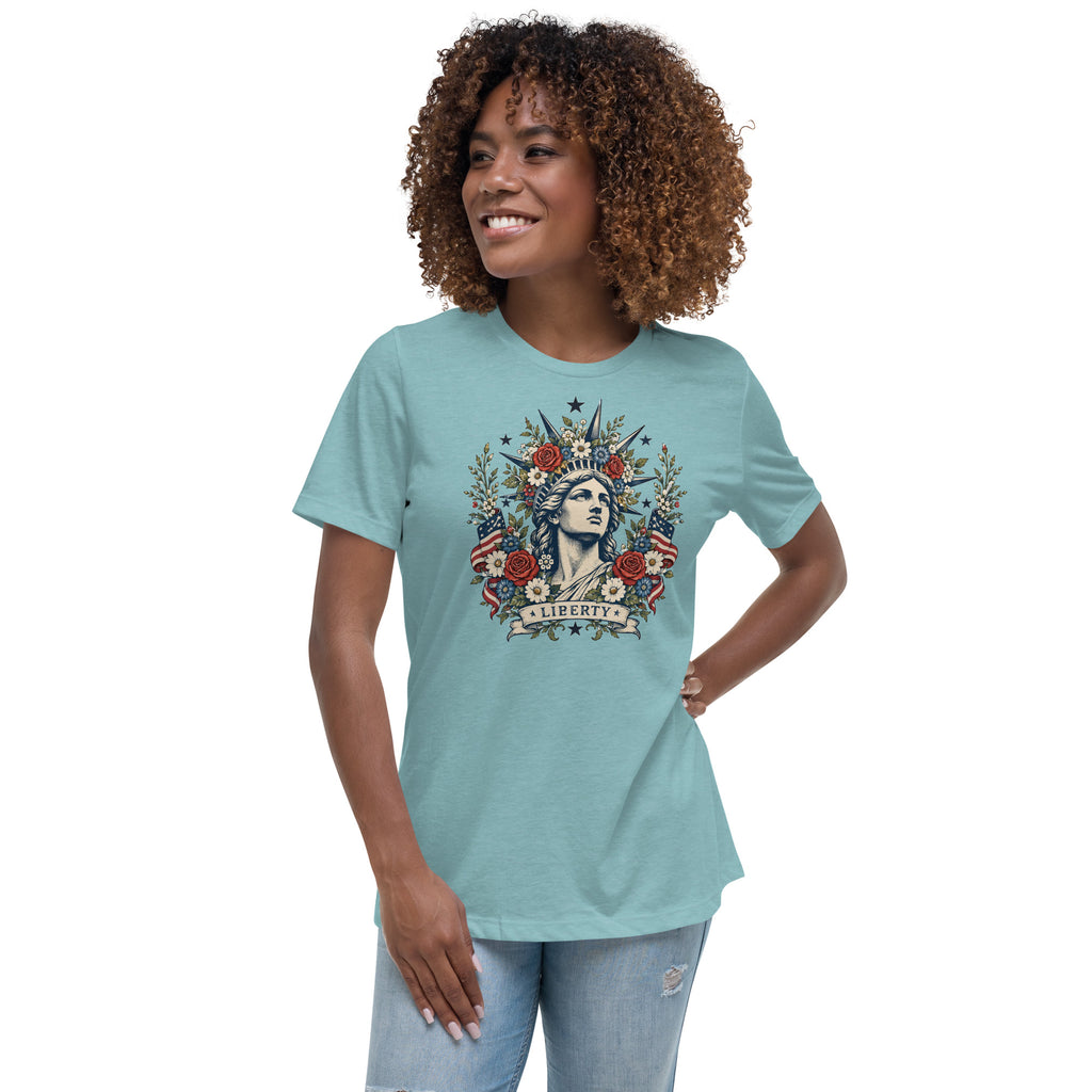 women's blue t-shirt with lady liberty inspired graphic with florals and Liberty written across the bottom