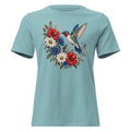 women's blue t-shirt with red, white and blue floral graphic and a hummingbird