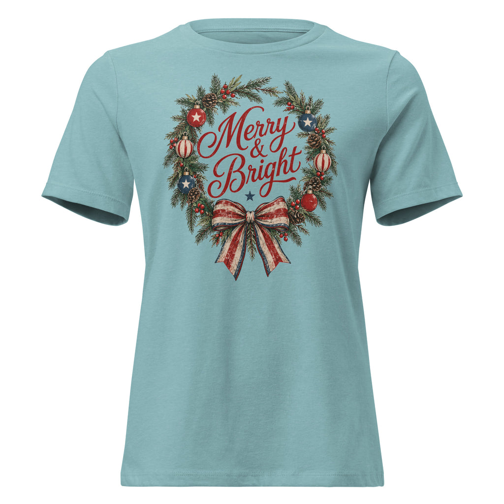 women's blue Christmas t-shirt with a wreath and bow that says "merry and bright" with red and blue accents