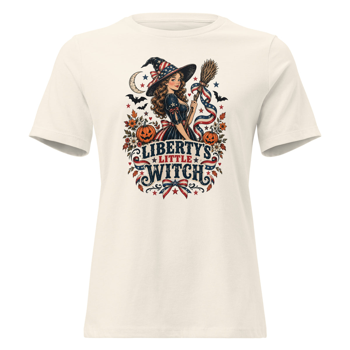 off-white women's shirt with American theme witch, and halloween/fall inspired small icons with text saying "Liberty's Little Witch"