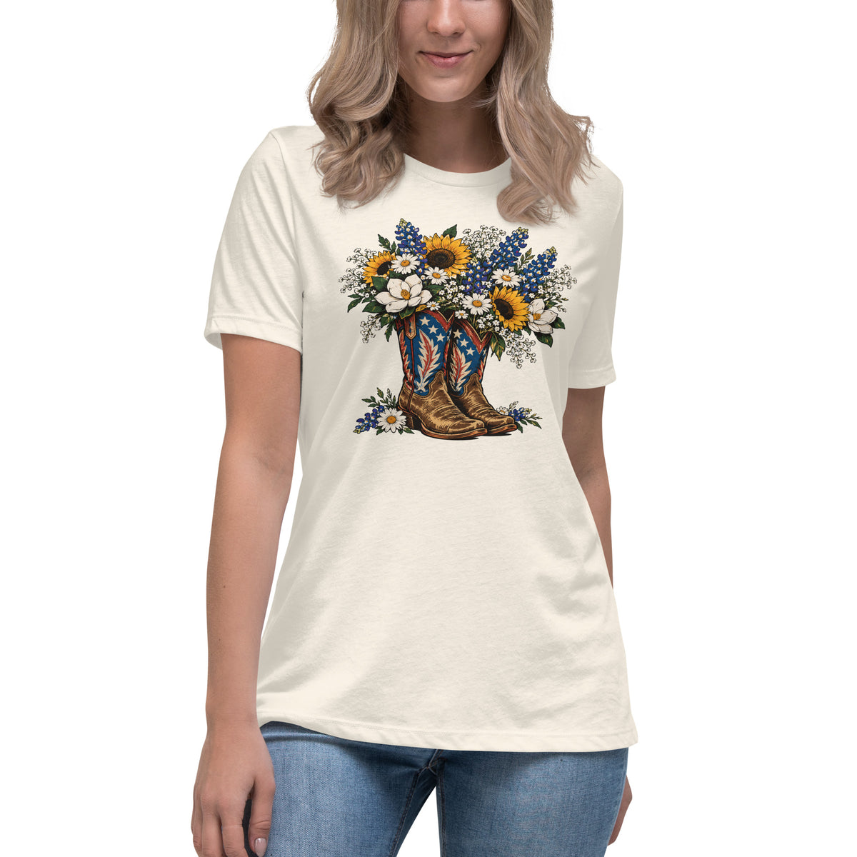 white women's t-shirt with red, white, blue cowgirl boots graphic with wildflowers coming out of it