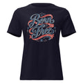 navy women's shirt with Born Free in scripted lettering and a red ribbon lacing around the words
